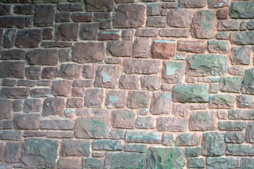 Reddish stone wall, can be used as a background