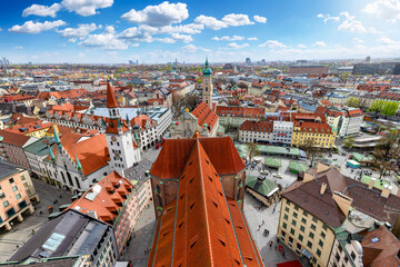 Panoramic view of the skyline of Munich, Germany, with Viktualienmarkt and old townhall during a sunny day - 776357141