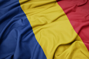 waving colorful national flag of romania.