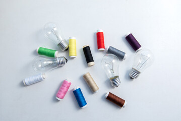 Spools of thread and light bulbs	