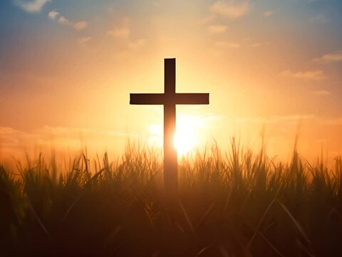 Orthodox religious cross in a field against the backdrop of sunset as a symbol of faith and Easter holiday