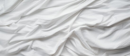 Detailed view of a single white sheet placed on a plain white background, highlighting its texture and clean appearance