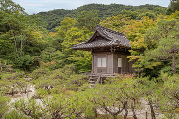 Fototapeta na wymiar Little shrine isolated in a beautiful garden. Villa found in Okochi Sanso garden in Arashiyama, Kyoto – Japan. 