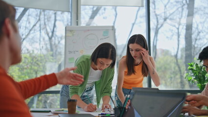 Creative startupers brainstorming business office. Coworkers discussing project