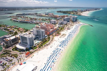 Photo sur Plexiglas Clearwater Beach, Floride Clearwater Beach Florida. Florida beaches. Panorama of city. Spring or summer vacations. Beautiful view on Hotels and Resorts on Island. Blue color of Ocean water. American Coast. Gulf of Mexico shore