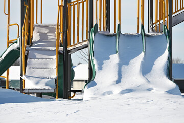 Snow on the Playground Slides