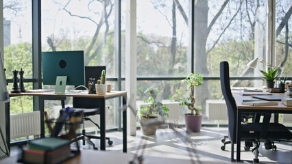 Creative office workspace room. Selective focus on steel sculpture. No people