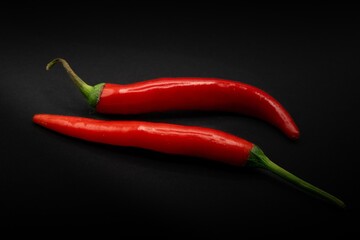red hot chili peppers, black background