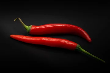 Fototapete Rund red hot chili peppers, black background © WD Suncrest