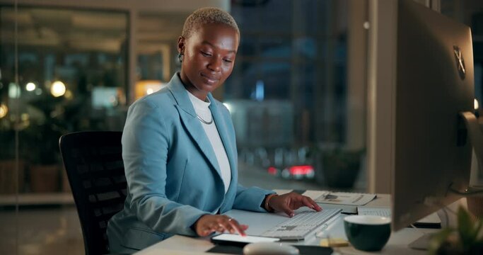 Business woman, typing and computer in office at night and online research for productivity on project. PR consultant, technology and black person at desk for email and networking in media company