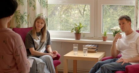 Open dialogue. Counseling session or therapy session where couple is seeking guidance or advice from professional therapist or counselor. Neutral and impartial facilitator who guides the conversation.