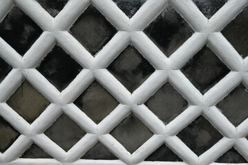 Japan Travel. Traditional Japanese wall pattern, called Namako Wall in Japan. A wall covered square tiles jointed with raised plaster. Matsuzaki Town, Shizuoka Prefecture, Japan.