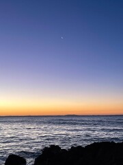 Fototapeta na wymiar Sunset in summer at Seventeen Seventy, on the Great Barrier Reef, Queensland, Australia