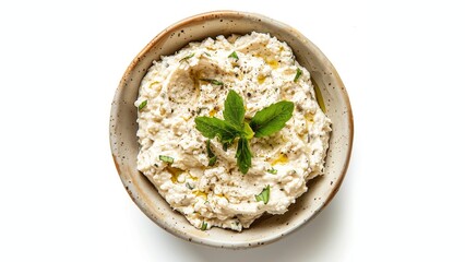 a bowl of greek taranma dip on white background