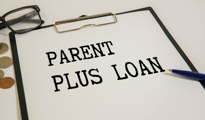 Parent PLUS Loans sign on the piece of paper