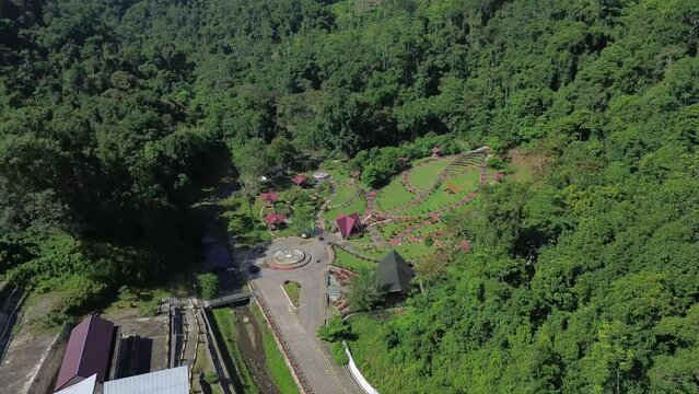Aerial view on the ultrabasa park and kebun raya kendari. Drone movement sideways 4K image quality.