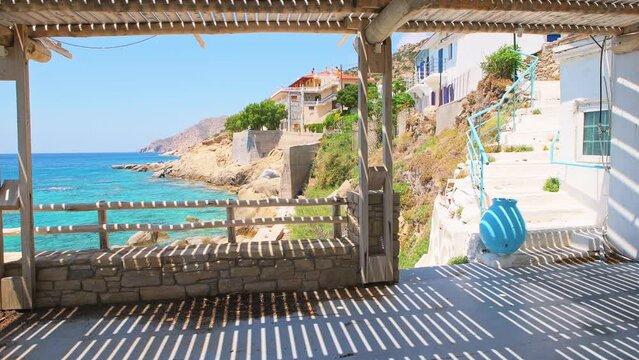 Karkinagri, Ikaria island of Greece fishing fishing village and tourist resort small town with view on coastal buildings houses and Icarian sea