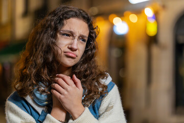 Sad unhappy teenager girl thinks over life concerns, suffers from unfair situation. Problem,...