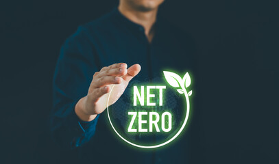 Businessman holding net zero icon with globe outline background for Net zero and carbon neutral...