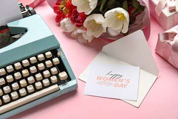 Vintage typewriter, gift boxes, bouquet of flowers and postcard for Women's Day on pink background