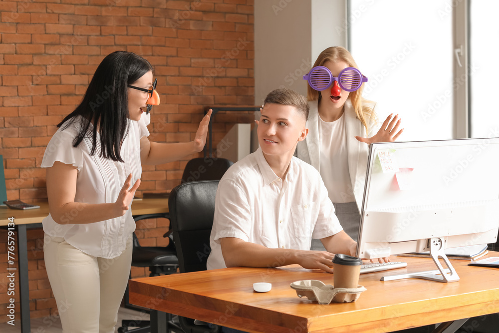 Poster Business people with funny disguise working in office. April Fools' Day celebration