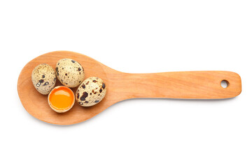 Wooden spoon with fresh quail eggs on white background