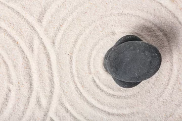 Crédence de cuisine en verre imprimé Pierres dans le sable Stones on sand with lines in Japanese rock garden, top view. Zen concept