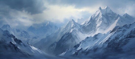 Snow-covered mountains with misty clouds against a backdrop of a clear blue sky - Powered by Adobe