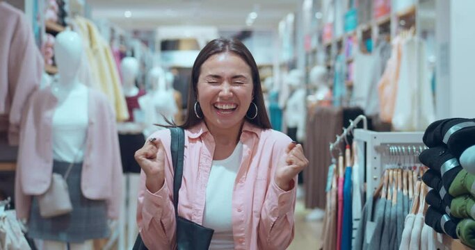 Woman in clothing store looking at camera with happiness laugh. Woman's happiness in her eyes reflecting sincere emotions Woman's happiness epitome shopping pleasure genuine feelings.