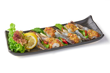 Fresh shrimp soaked in fish sauce and topped with seafood dipping sauce and sliced chili, garlic...