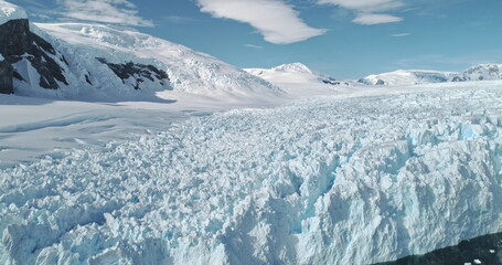 Aerial of ice glacier at ocean bay. Environment preserve from global warming and climate change....