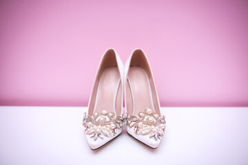 Elegant wedding shoes for bride. Wedding concept. Luxury bride's shoes.
