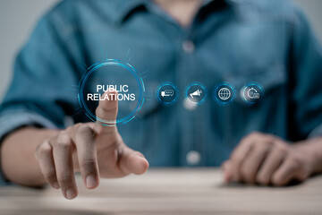 PR, Public relations concept. Businessman touching public relations on virtual screen for...
