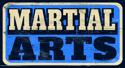 Aged retro martial arts sign on wood