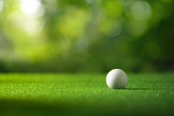 Close-up golf ball on fairway golf course.