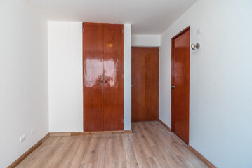 interior of bedroom with built-in closet