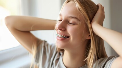 braces on teeth Beautiful red lips and white teeth with metal braces. A girl's smile.