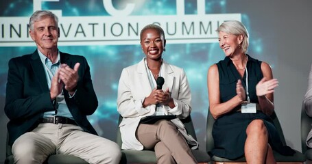 Presentation, conference and business people on a stage, applause for thank you, success or well done. Teamwork, speakers and men and women in seminar, tradeshow or convention for tech and innovation