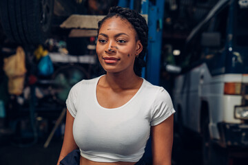 Portrait of woman Auto mechanic are repair mechanical part and maintenance auto engine is problems...