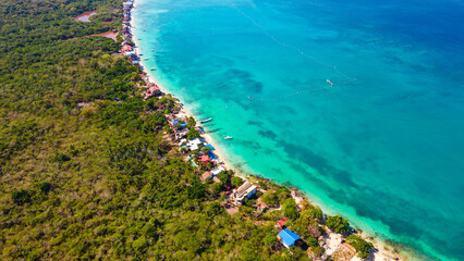 Aerial view of Baru, Cartagena showcasing the vibrant turquoise waters, lush greenery, and serene beaches