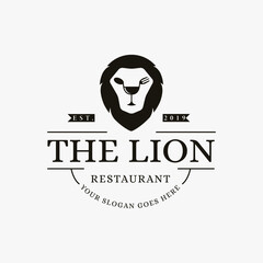 Creative vintage retro hipster logo of restaurant with lion face spoon fork and wine glass