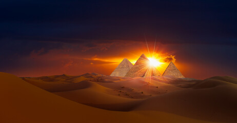 Giza Pyramid Complex at sunset sky - Cairo, Egypt