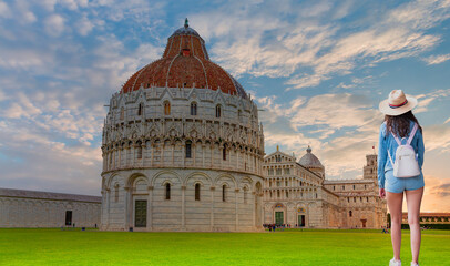 Cathedral (Duomo of Santa Maria Assunta) and The Baptistery of Pisa Leaning Tower at the Piazza dei...