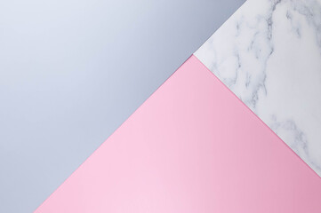 Blue, pink and marble background. Pastel colourful wallpaper, marble texture, copy space.