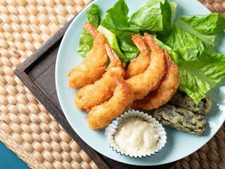 Fried shrimp and sauce on a plate