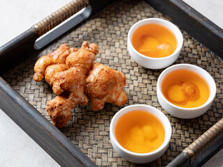 Fresh ginger, warm ginger tea	