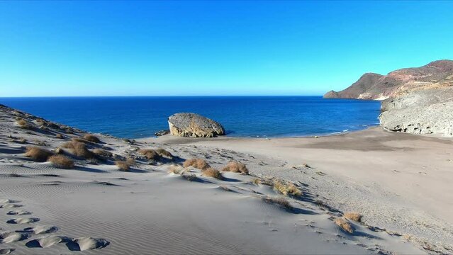 Panning shot view of the heavenly Monsul Beach, in Cabo de Gata, Almeria, Andalusia, Spain