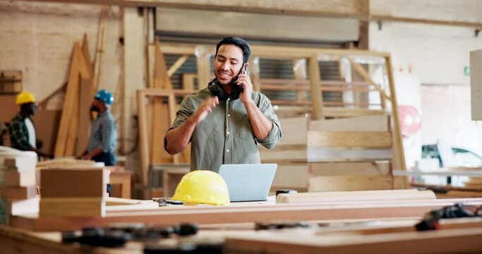 Phone call, carpenter and man in workshop on laptop for maintenance, remodeling and construction business. Factory, furniture and person on smartphone for contact, talking and chat for online order