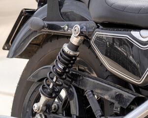 Motorcycle Rear Wheel on Shock Absorber and Spring - Suspension