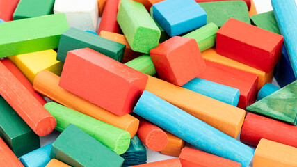 Closeup of different colors of wooden blocks. Colorful wooden blocks background.